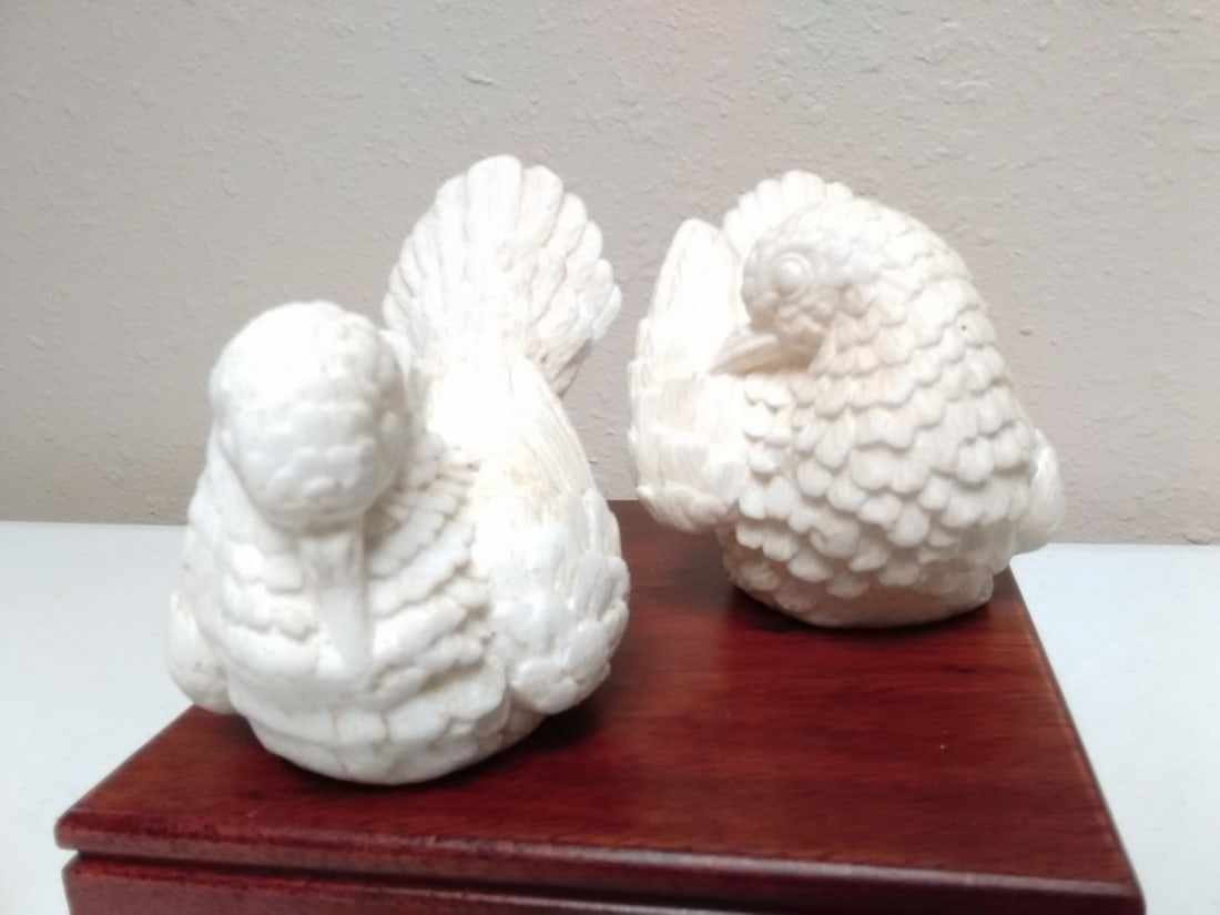 A Pair of Ceramic Doves: 4 1/2 inches long x 3 1/2 inches at the tallest point