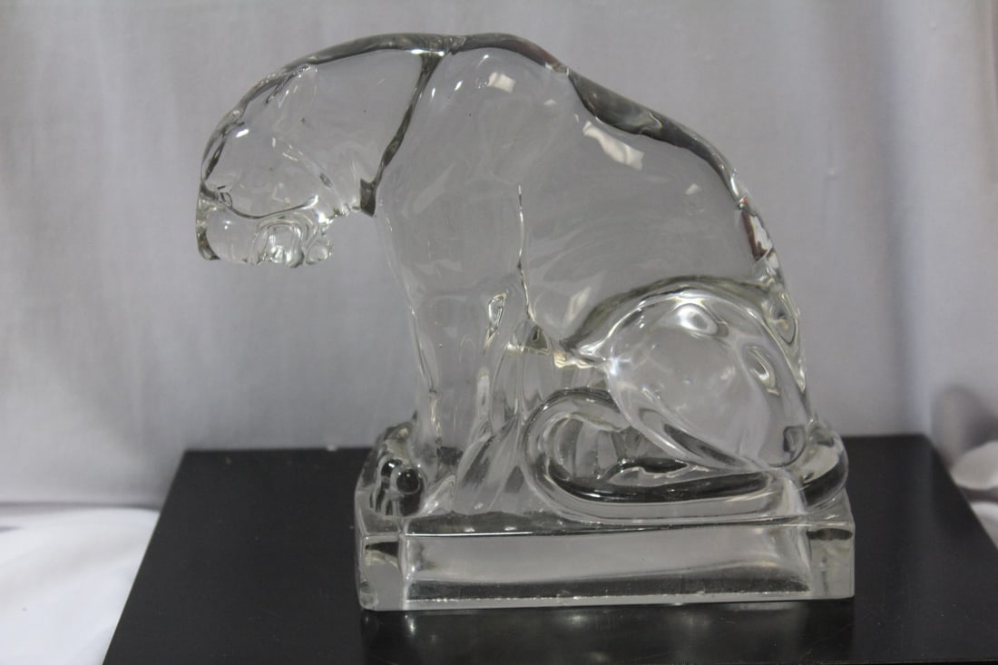 A Glass tiger: 6 3/4" tall - please note: chip on the bottom