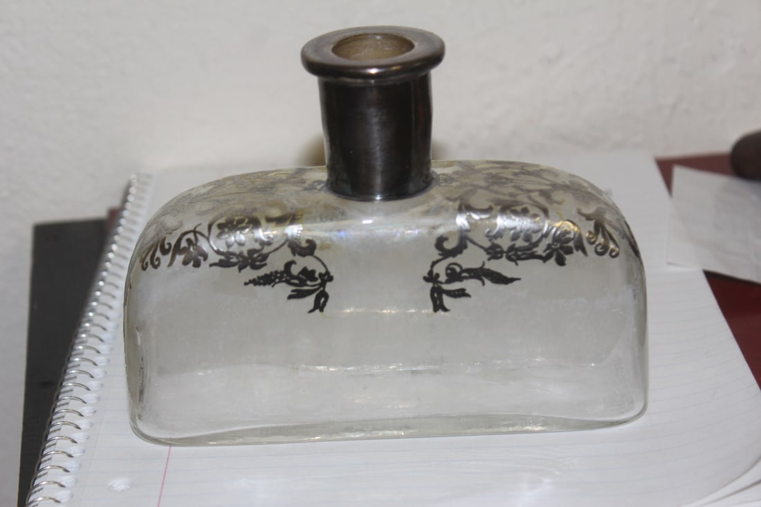 Sterling Silver Overlay Bottle: please note: needs a cleaning and a stopper - 6 inches wide