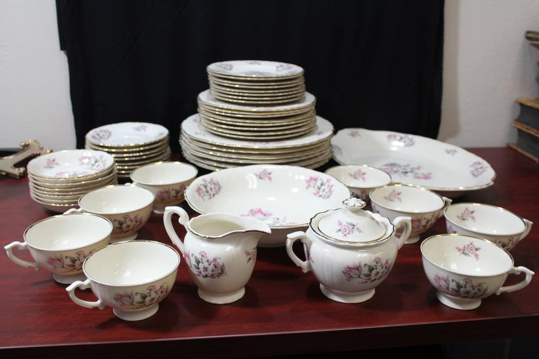 A Partial Set of Aberdeen China: 50 pieces in total, to include= 8 bread plates; 8 salad plates; 6 dinner plates; 8 cups; 8 saucers; 8 small bowls, an oval platter, a larger salad bowl; sugar container and creamer - dinner plate= 10