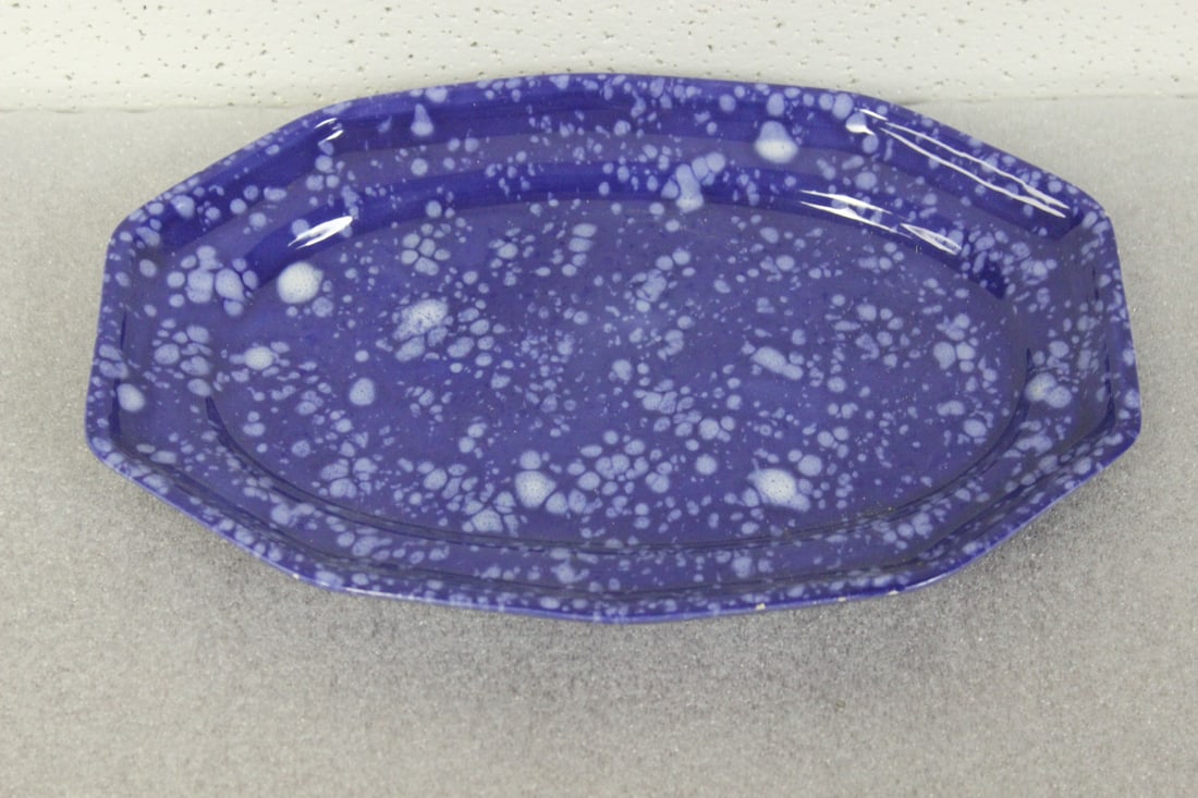 A Vintage Small Blue and White Platter: 10 1/2" across
