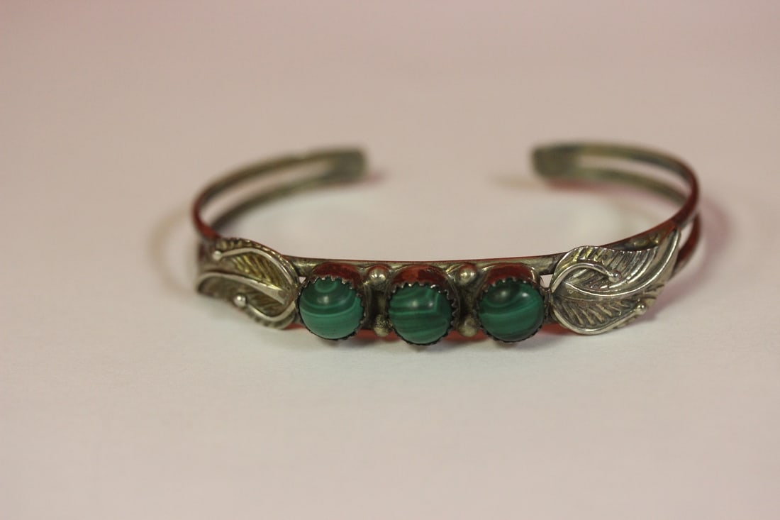 A Malachite and Sterling Bangle Bracelet: most likely navajo, but you are the final judge