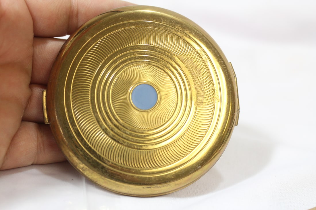 A Coty Compact: 3 1/4" in diameter