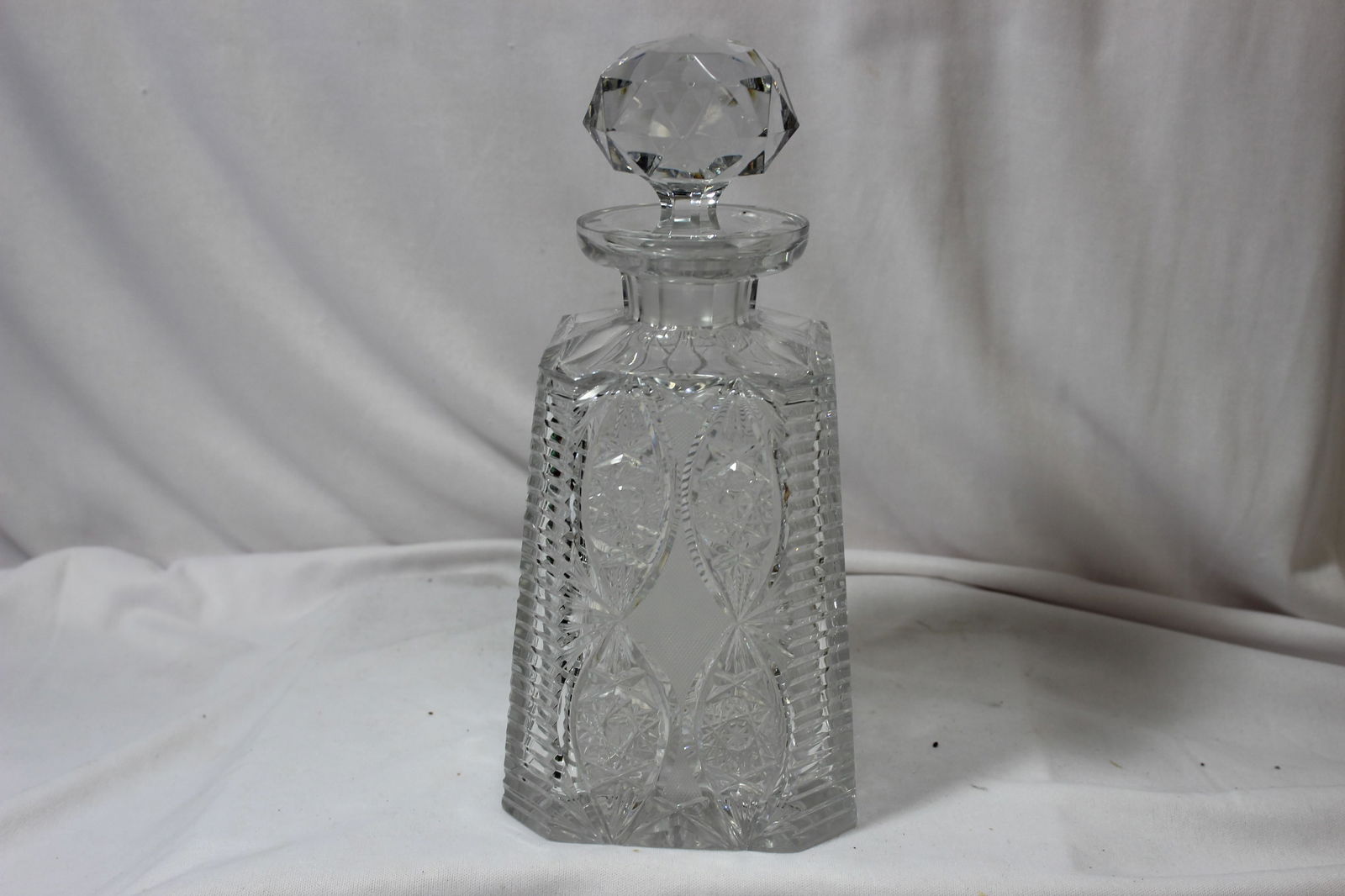 An American Brilliant Cut Glass Decanter: Please note: small chip as shown - possibly by Clark - 9 1/2" tall