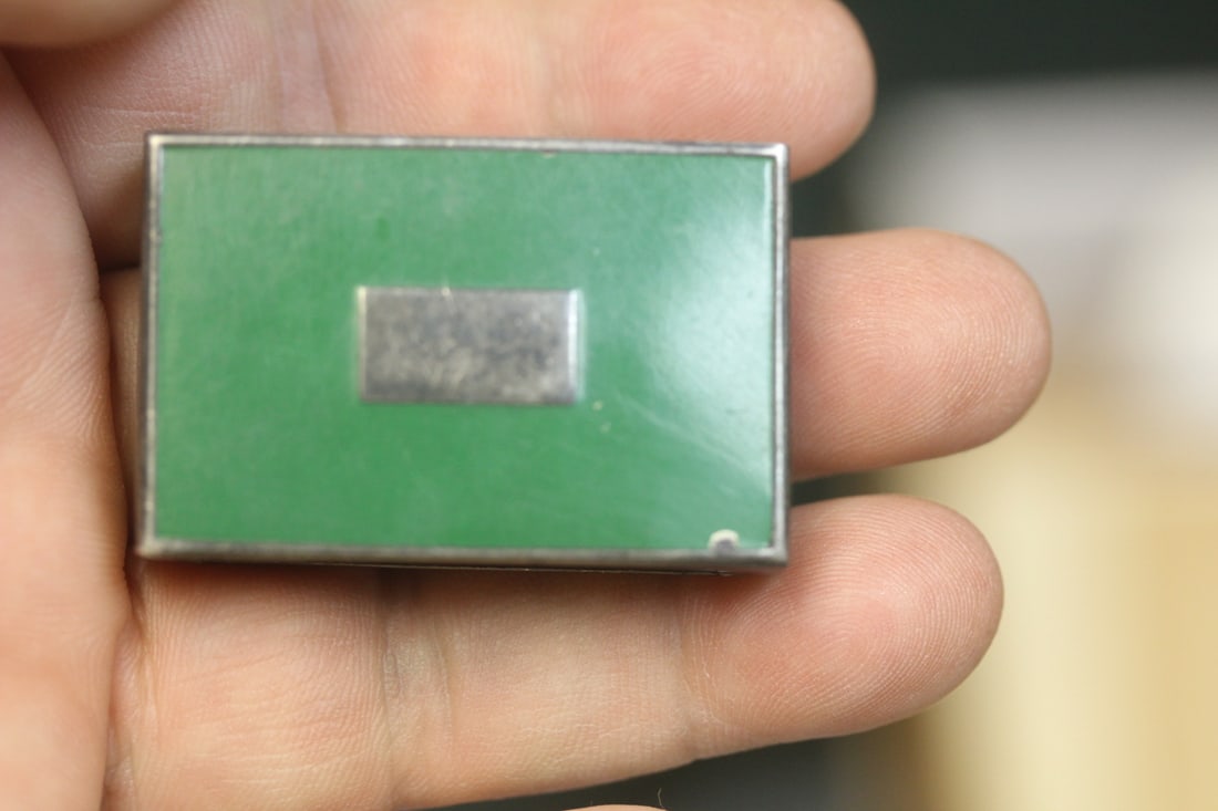 Enamel on sterling match box: 1 5/8" across