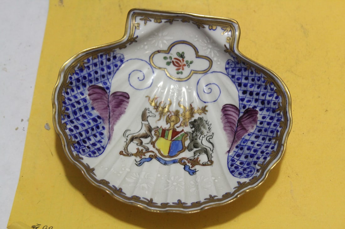 An Antique Limoges Shell Form Holder: most likely a soap holder - coat of arms motif - 5 3/4" in diameter