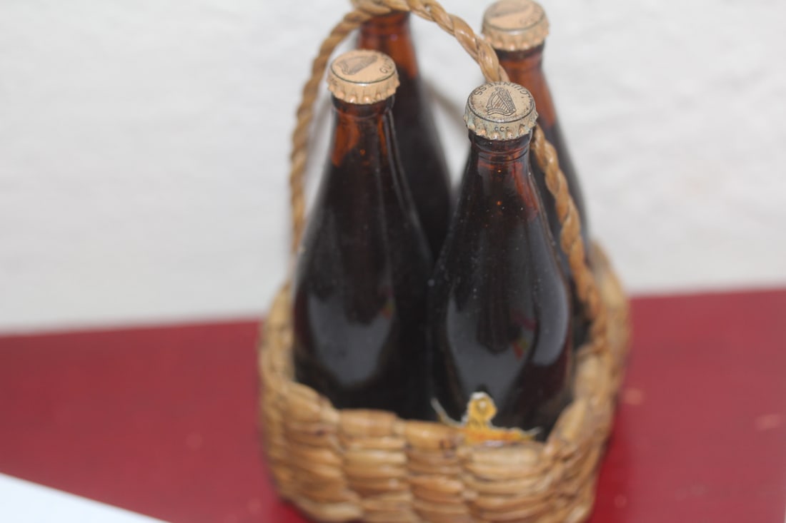 Salesman Sample of Guiness Beer (4): inside a basket - caution: do not drink content inside the bottle as it could harm you - bottle- 3" tall - rare