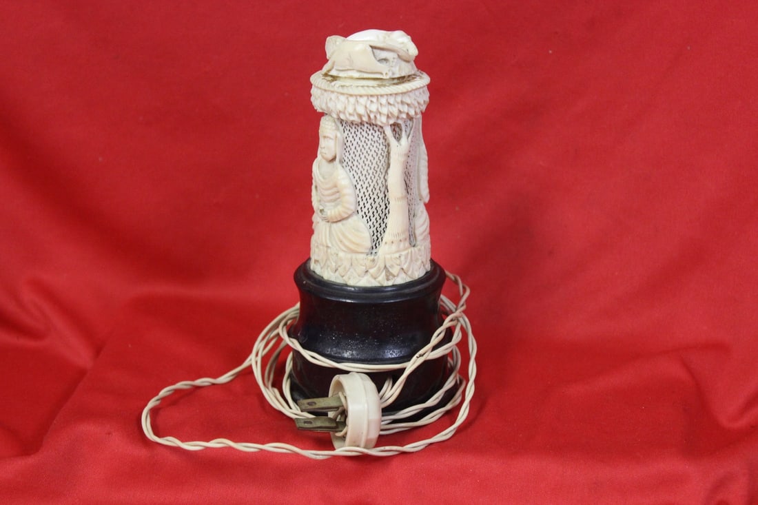 A Carved Bone Lamp: Some small loss on the web - 6 1/2" tall