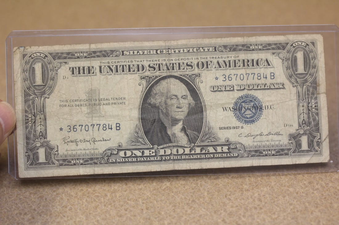 1957 One Dollar Blue Seal Star Note: as shown