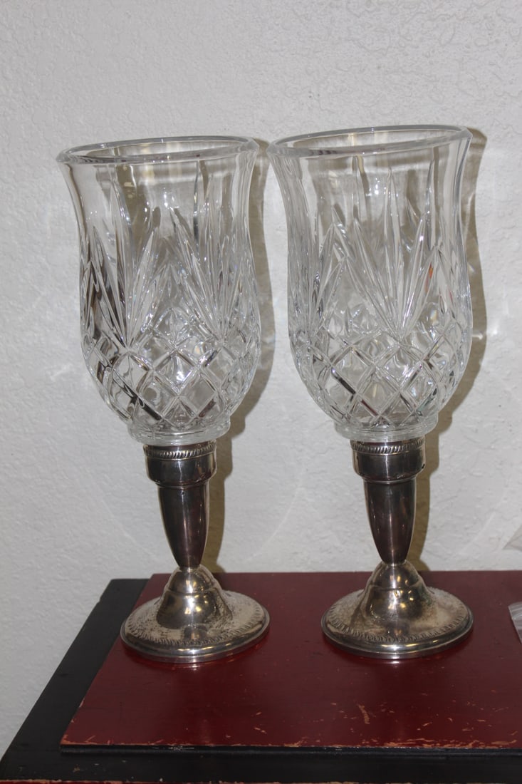 Pair of Weighted Sterling Hurricane Lamps: hurricane lamps or candles - weighted sterling and cut glass - overall= 11 5/8" tall