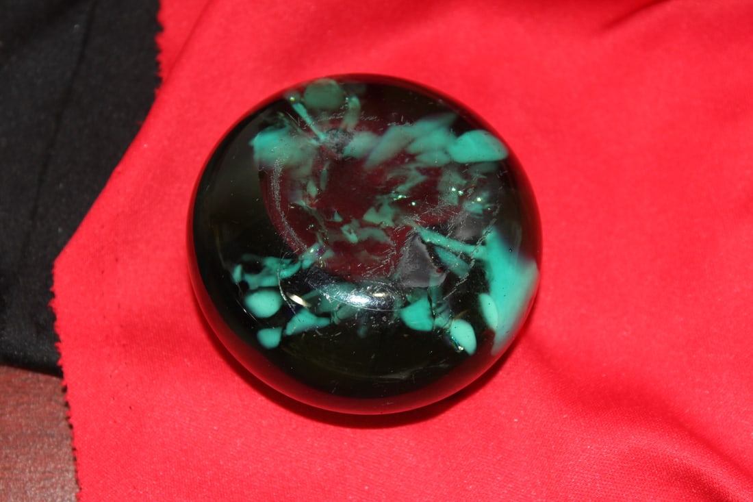 An Artglass Paperweight: please note: worn - 2 3/4" in diameter