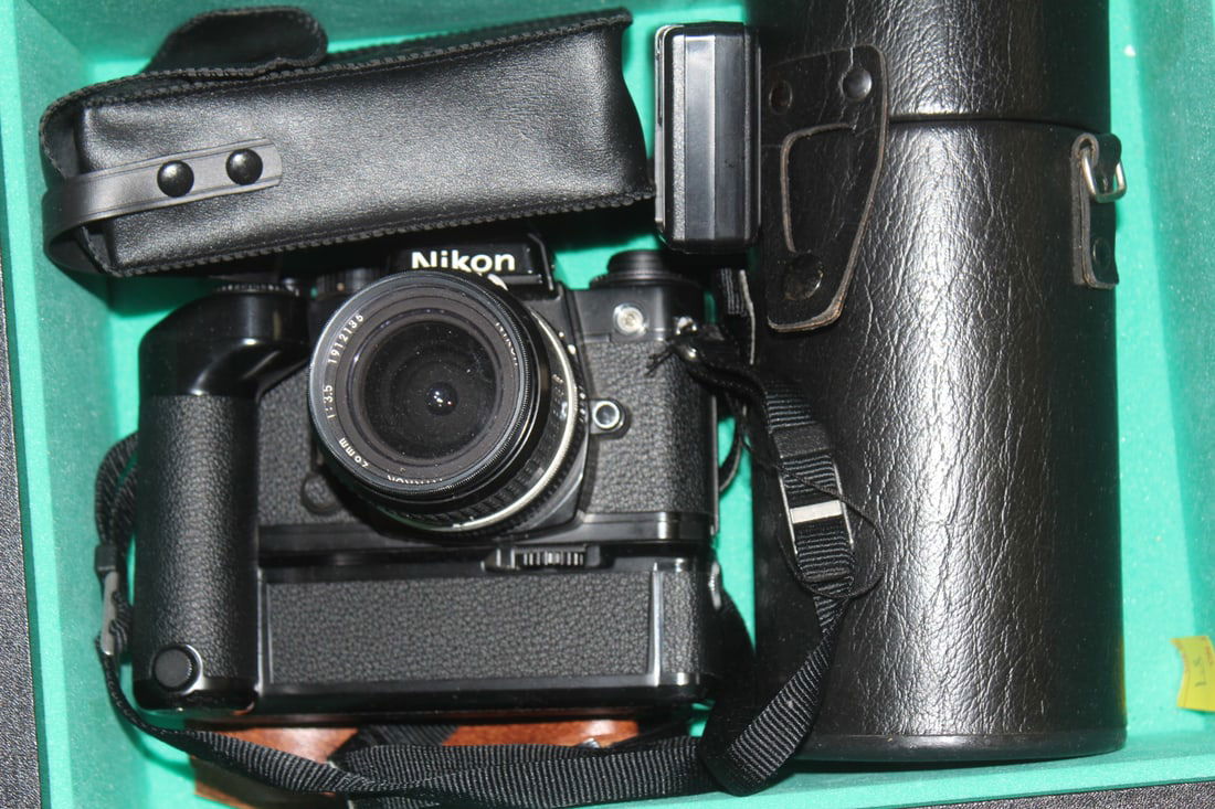 Nikon Fe Camera outfit: to include motordrive, extra vivitar lens, flashes etc - boxed - box measures at 12 1/2" x 7 1/2" - please note: not tested to see if works or not!