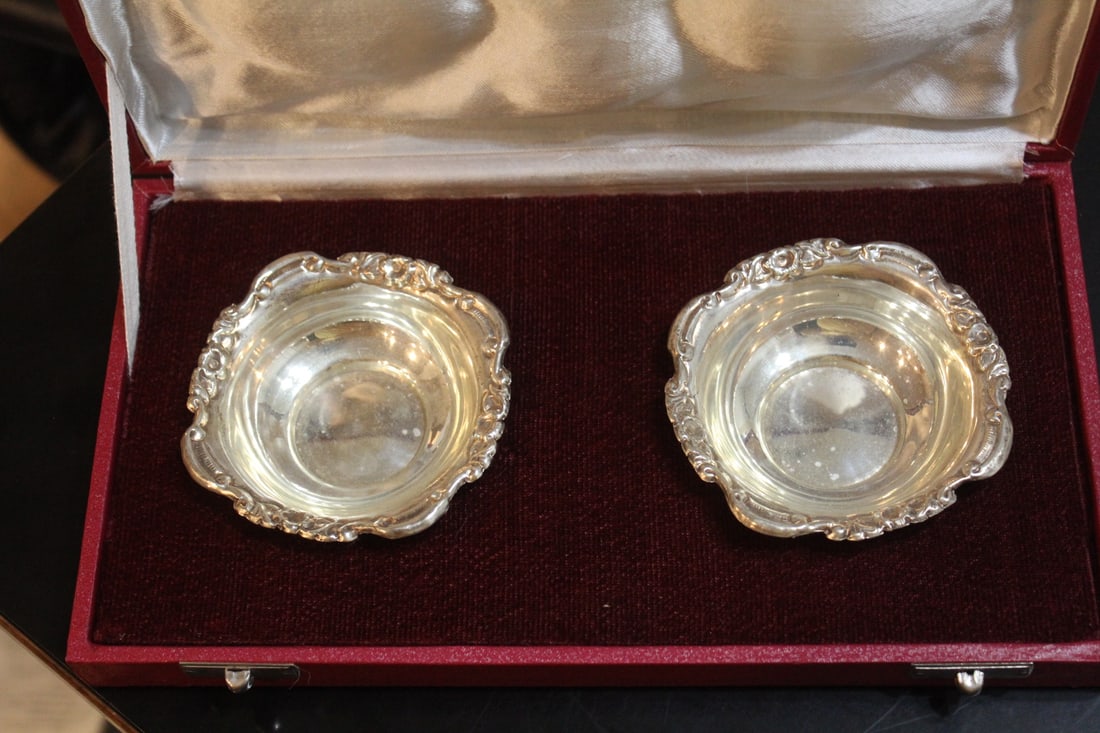 Pair of Silver Saucer: inside a fitted box - marked silver - 3 7/8" in diameter each