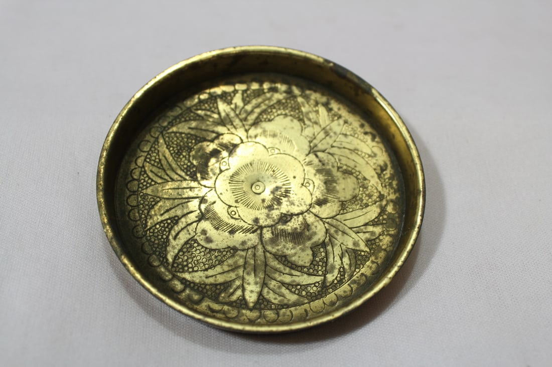 A Chinese Brass Coaster: marked "China" - 3 1/4" in diameter