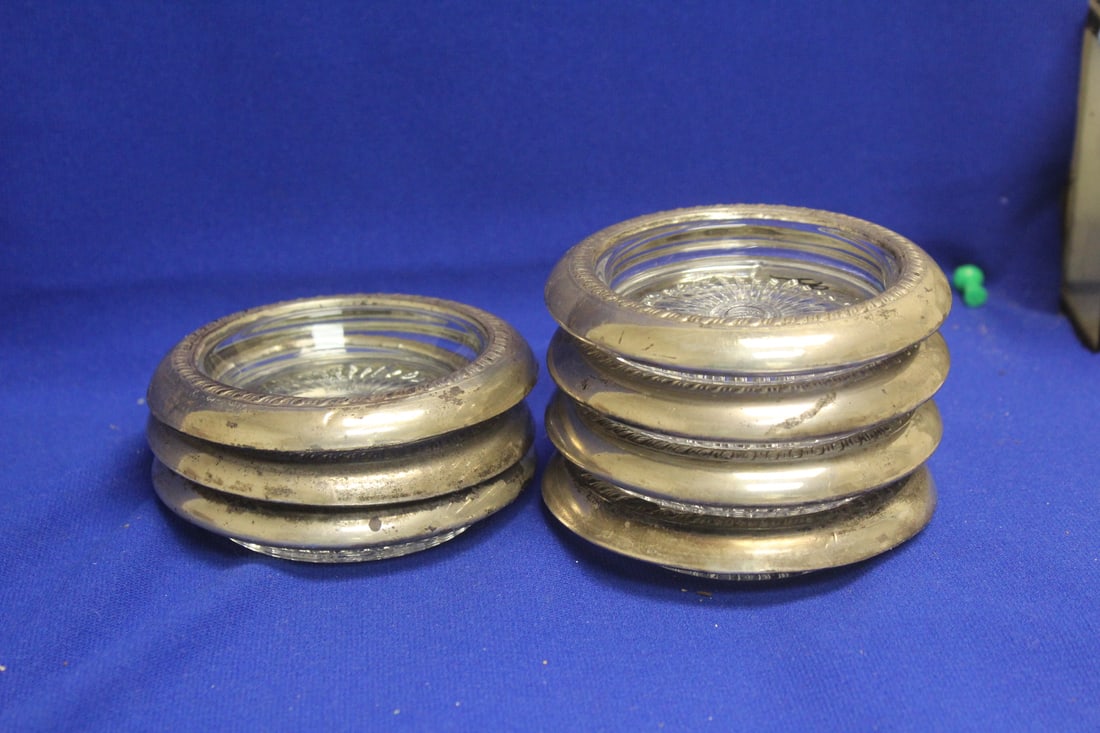 Lot of 7 Sterling Rim Coasters: as shown