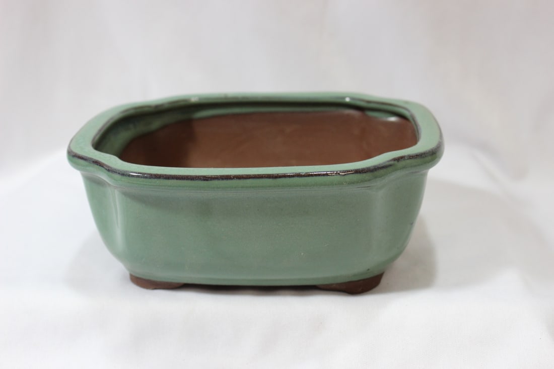 A Chinese Pottery Celadon Planter: 6 1/2" across