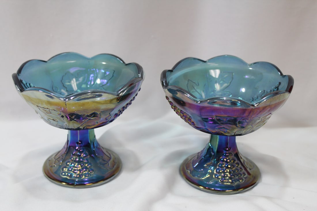 A Pair of Carnival Glass Candle Holders: 4 inches tall