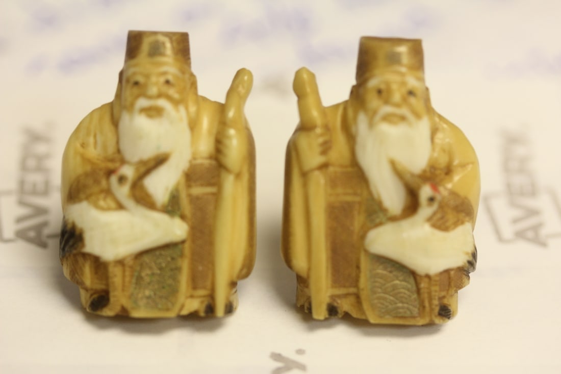 Signed Japanese Earrings: well carved - possibly bone , exception carving