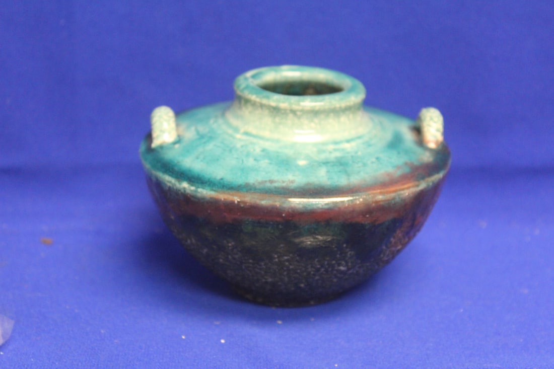 Art Pottery Embossed Fish Mark: attractive piece - 5 1/8" in diameter