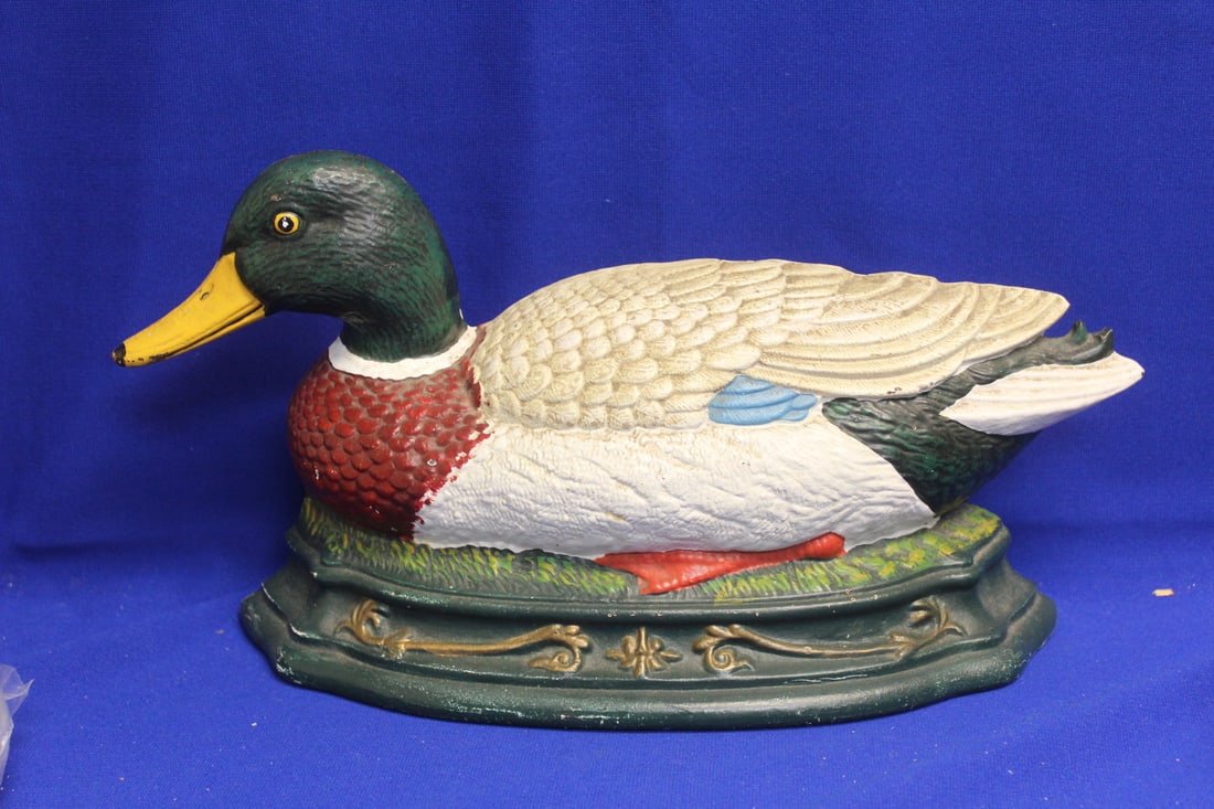 A Cast Iron Duck Door Stopper: 15 inches across