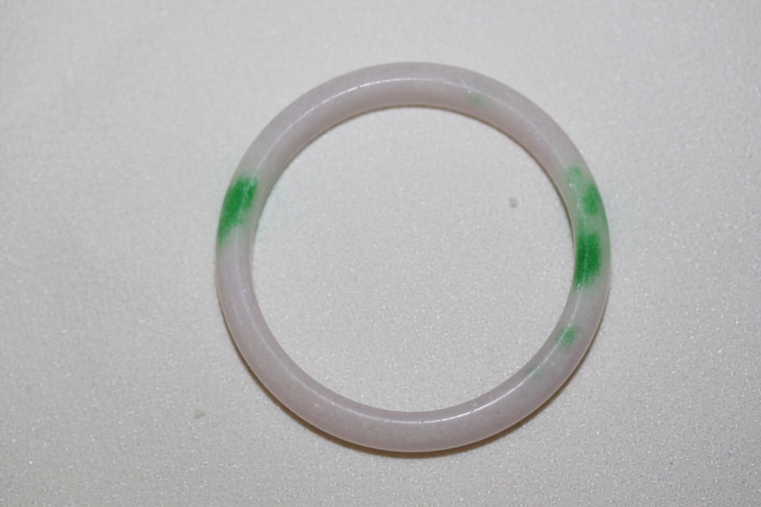 Jadeite Bangle Bracelet: 2 1/2" inside diameter. Nice color.
