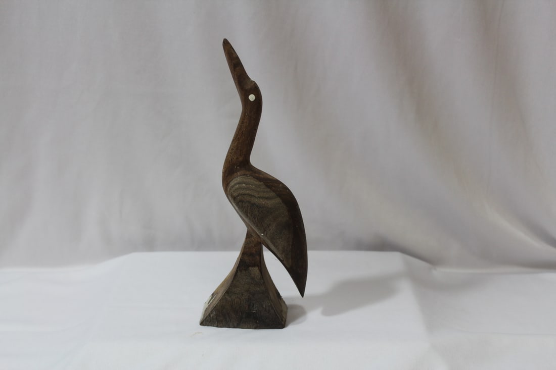 A Carved Wooden Bird: 9 1/8" tall - appears to be carved out of a single piece of wood