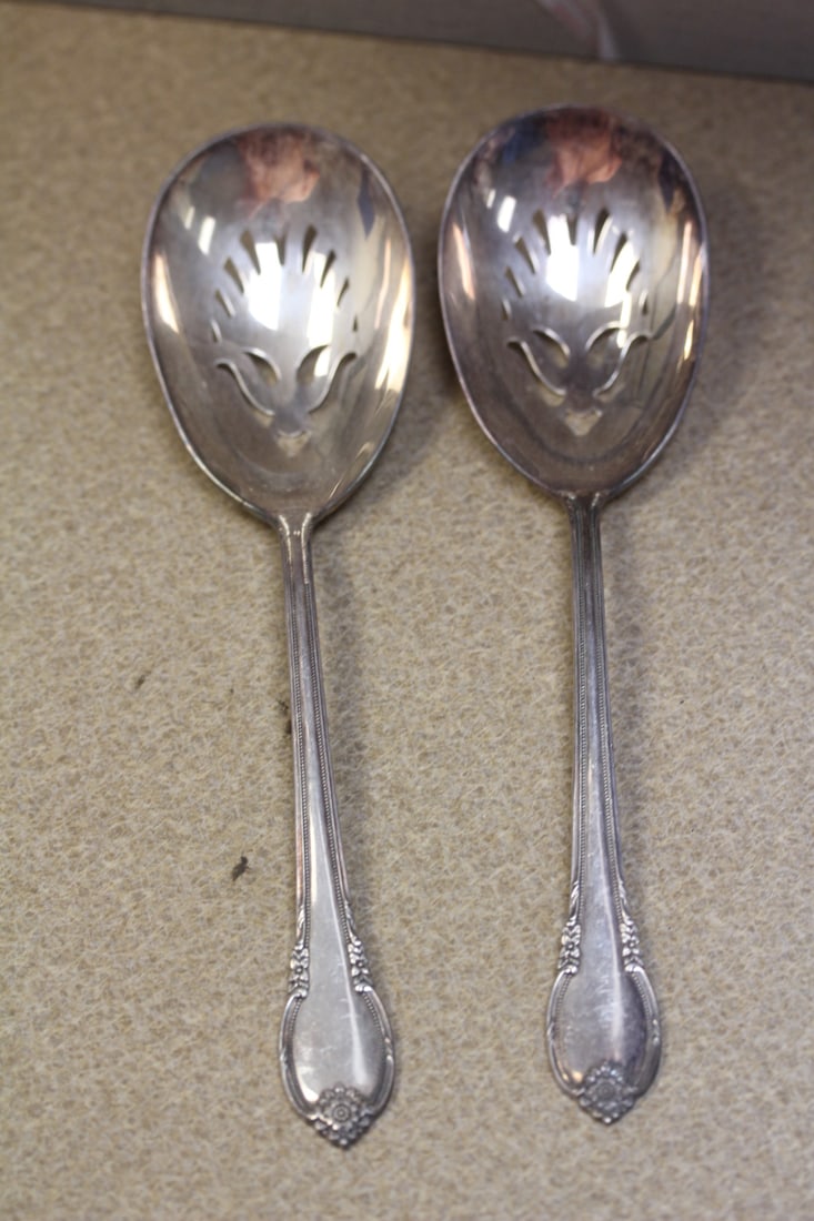Pair of Rogers Brothers Silver Plate Spoons: silver plate - pierced serving spoons - 8 3/4" long each