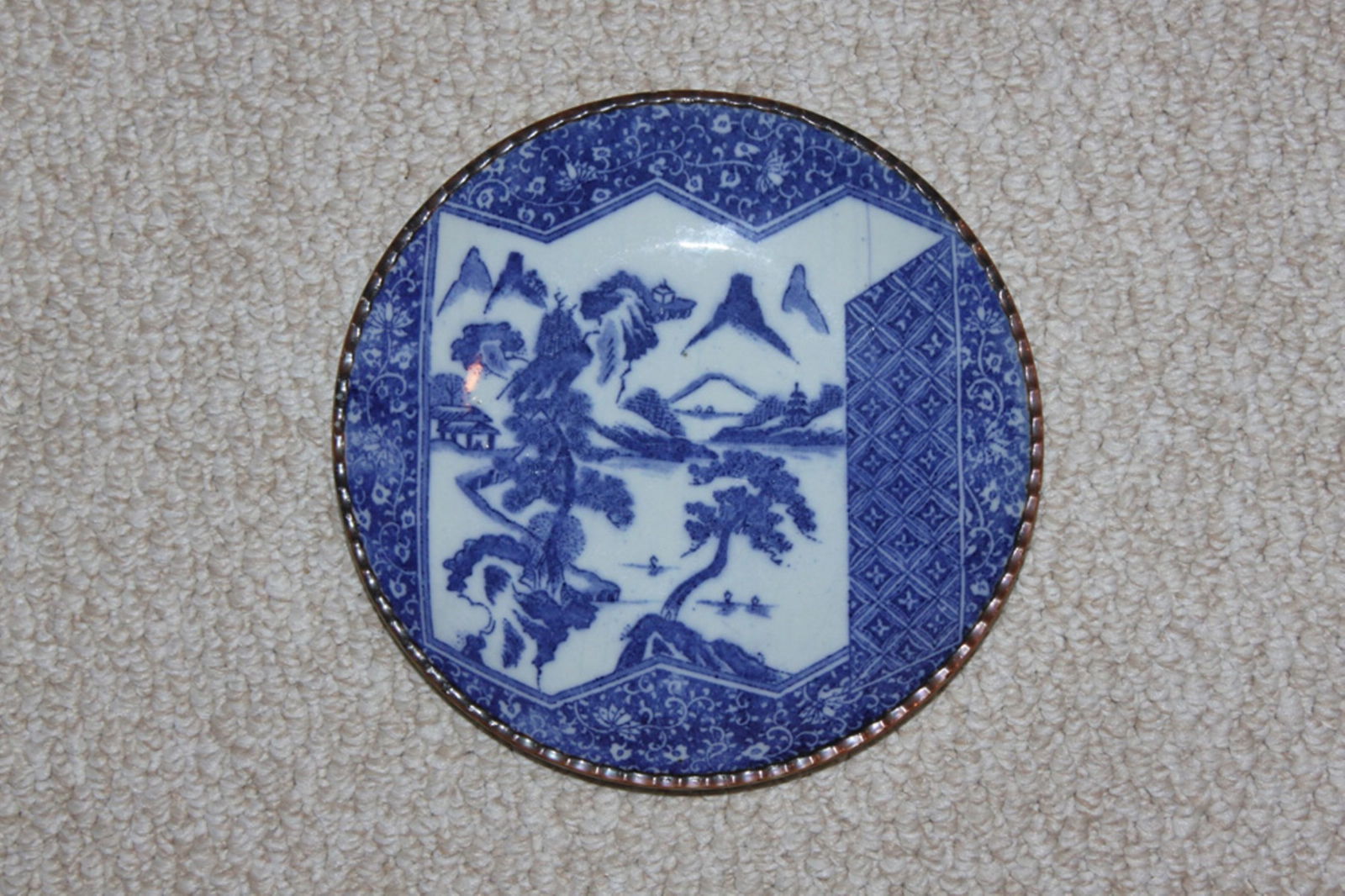 Antique Japanese Imari Blue and White Plate: 19th Century Edo Period. Measures 9 3/4" in diameter.