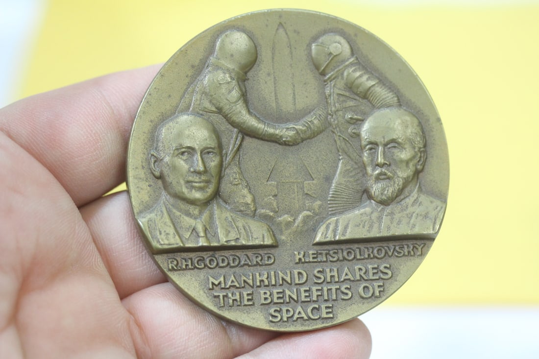 A Bronze Medal: "Mankind shares the benefits of Space" - 2 1/2" in diameter