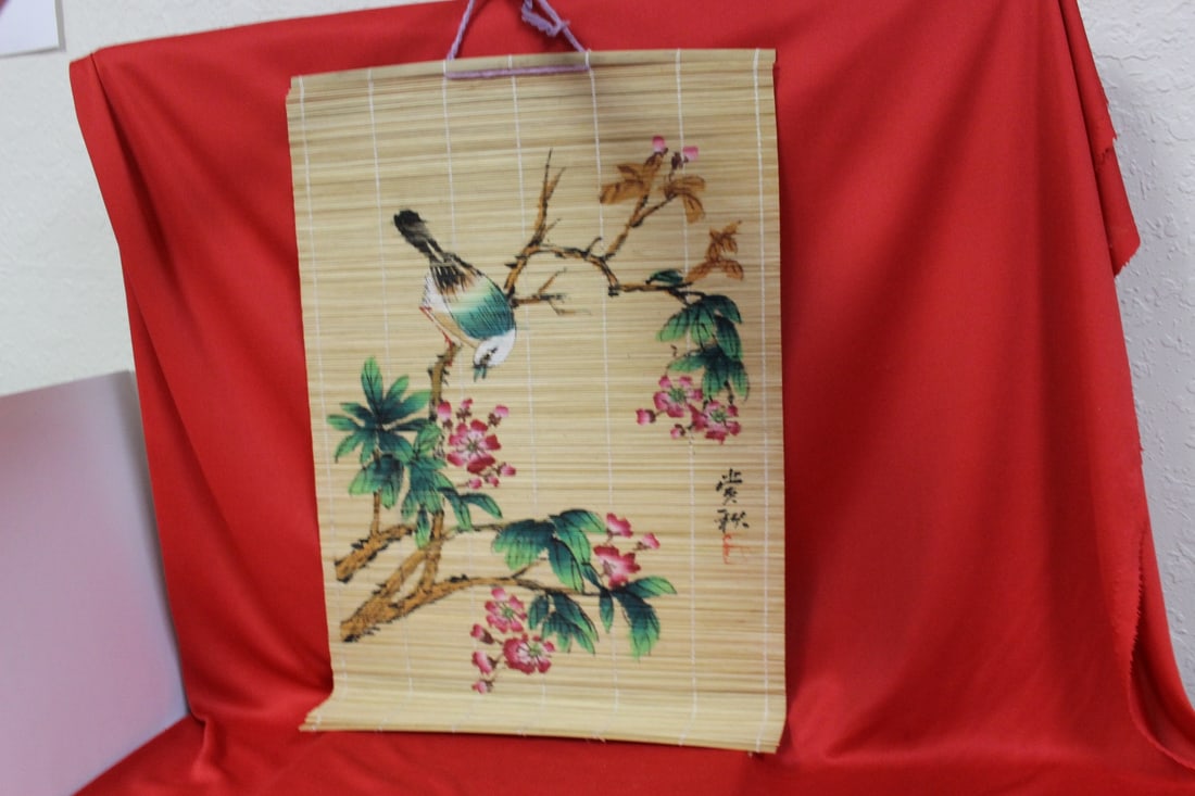 A Rattan Hand Painted Mat: 12" x 17 3/4" - signed