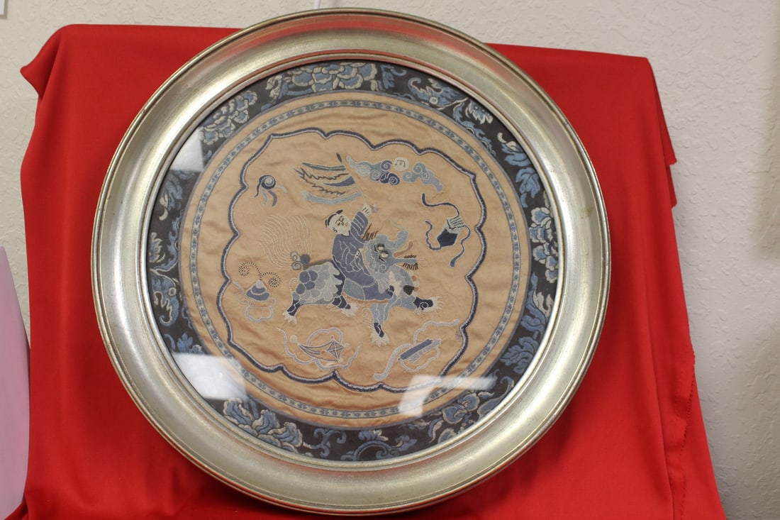 An Antique Chinese Embroided Silk: Framed - 19" in diameter