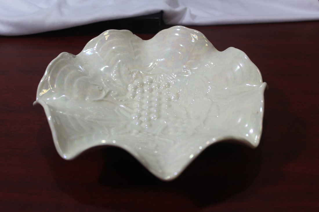 A Ceramic Bowl: please note: one chip - 8" in diameter