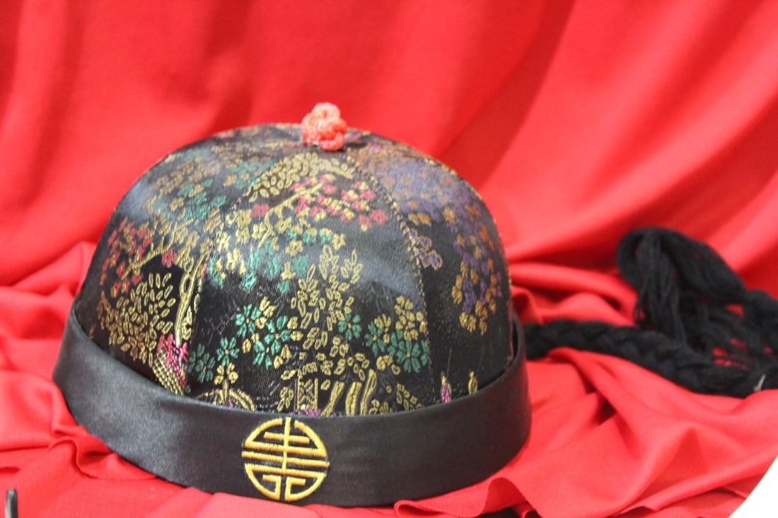 A Chinese Silk Hat: as s hown