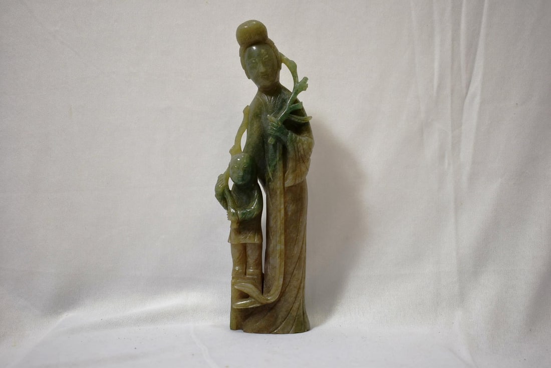 An Antique/Vintage Chinese Jadeite Kwan Yin: please note: losso n the flower branch - 9" tall - early 20th century