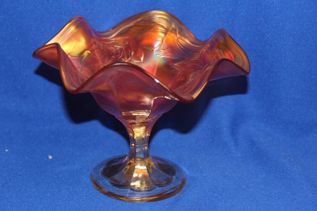 A Carnival Glass Stem Bowl: 5 inches tall