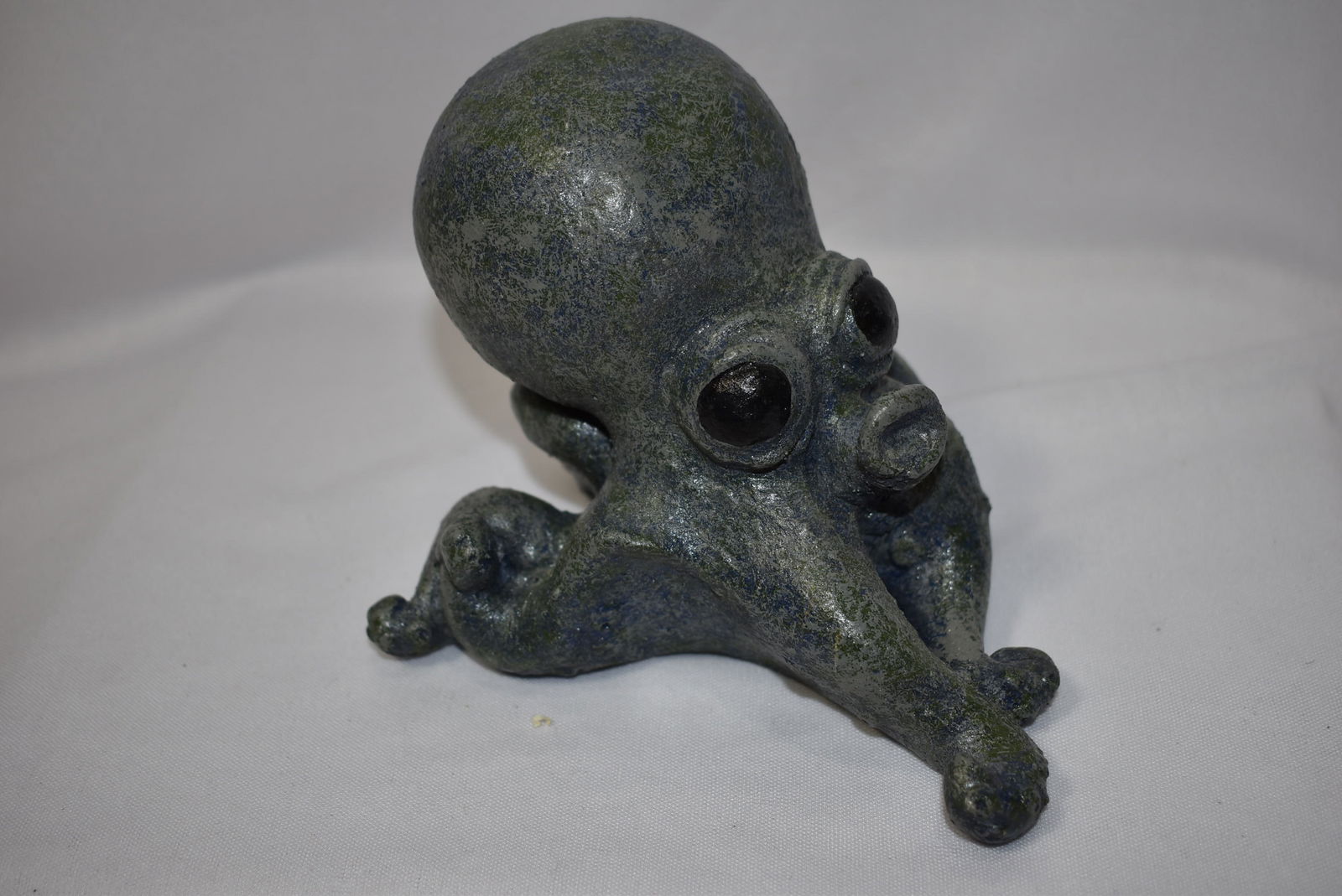 An Octopus Figurine: some sort of stone construction - 5 inches tall