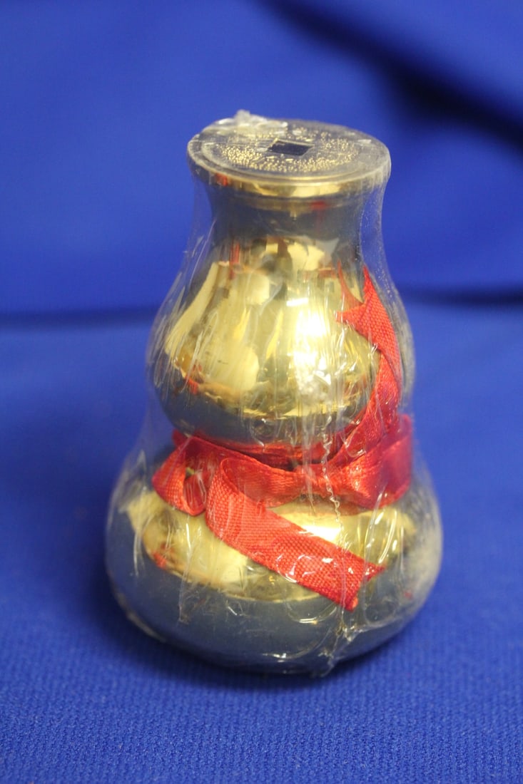 A Metal Gourd: still sealed - 3 inches tall