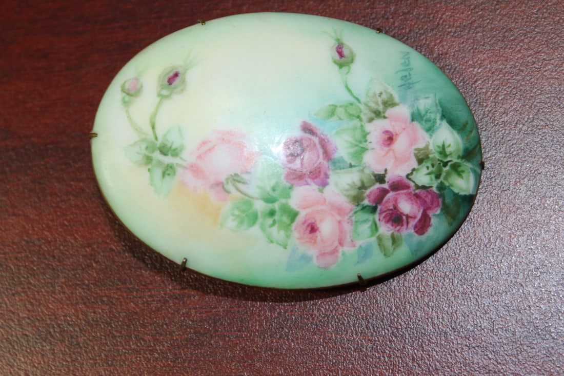 A Porcelain Brooch: 2 5/8" across - signed Helen - most likley victorian period