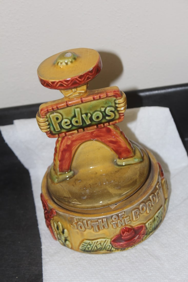 Spinning Ceramic Music Box: please note: small enamel loss on top of hat as shown - plays - 6 3/4" tall