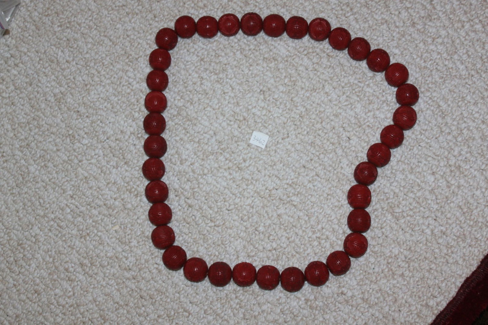 Large Chinese Cinnabar Circular Necklace: Antique / Vintage - 37 cinnabar beads. Each character bead is 1 1/8" or 30mm in diameter. Overall approximately 21" in length.