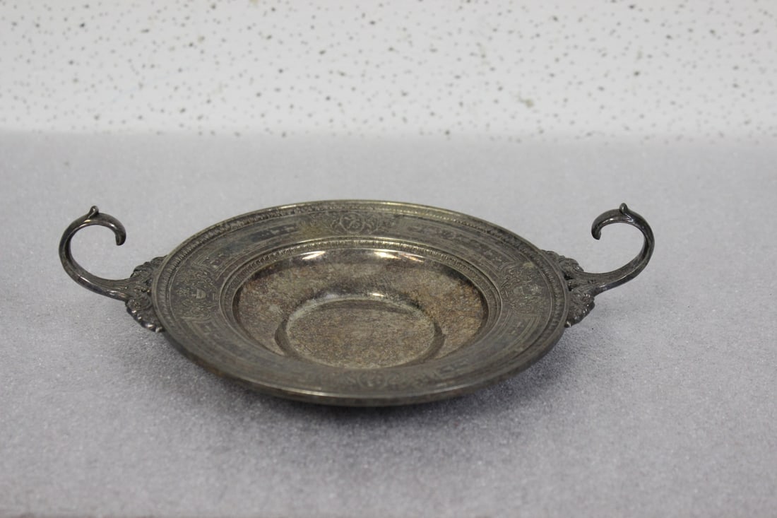 A Silverplated Tray: 8 1/2" in diameter including the handle