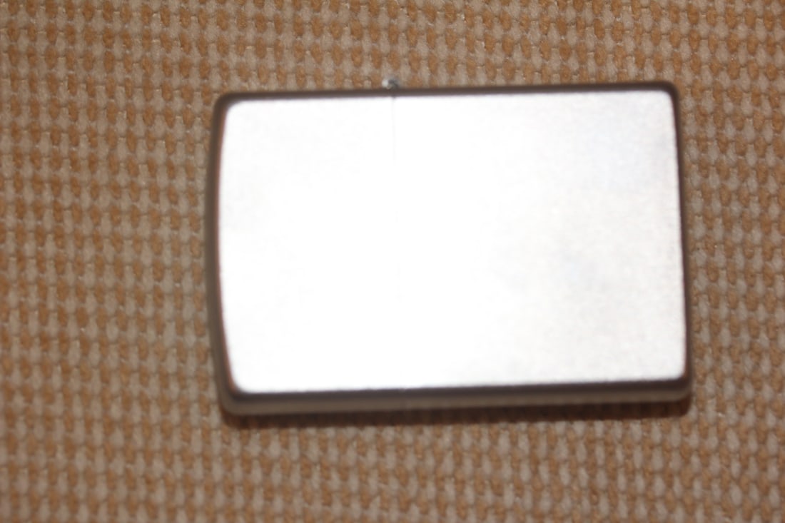 Zippo Lighter: as shown on photos