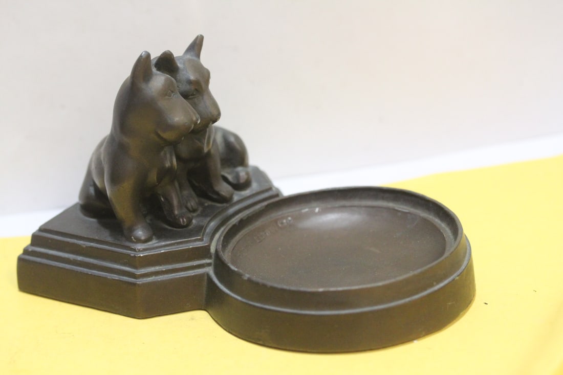 A Nuart Art Deco? Period Spelter Ashtray: depicting a pair of Scottish Terriers - 6 3/8" across