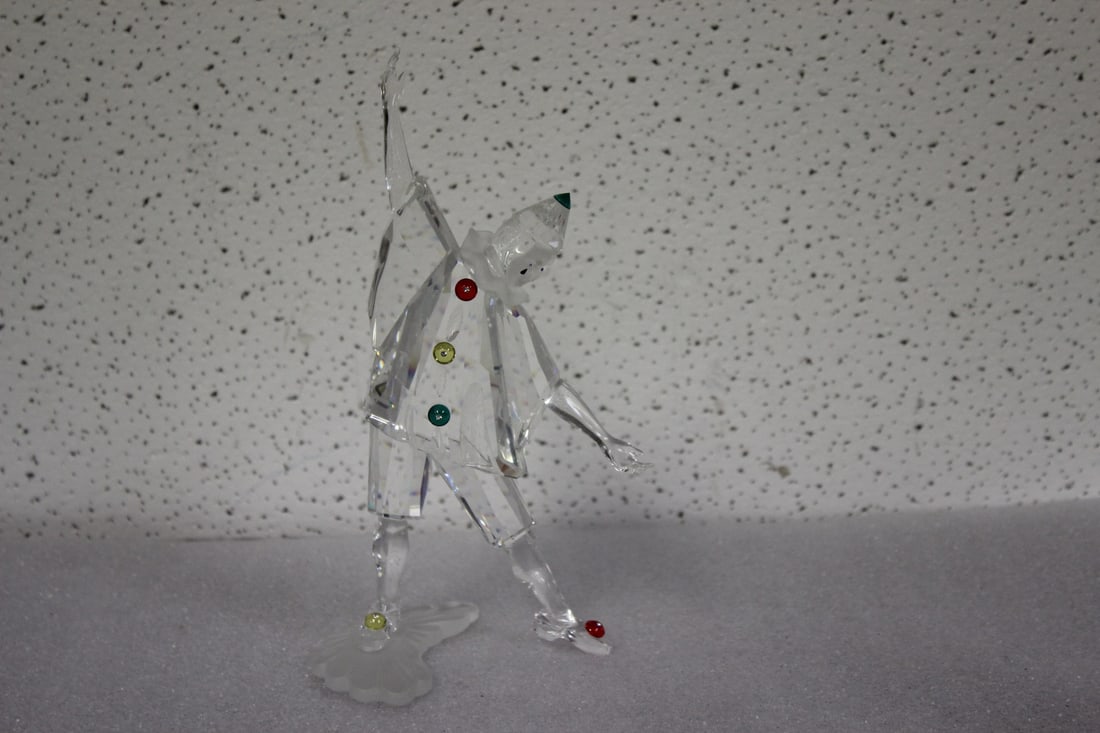A Swarowski Figurine: 8" tall - no box