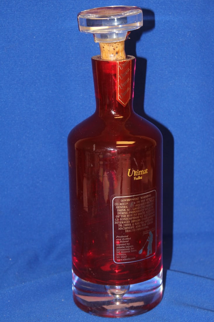 A Ruby Red Artglass Decanter: 11" tall