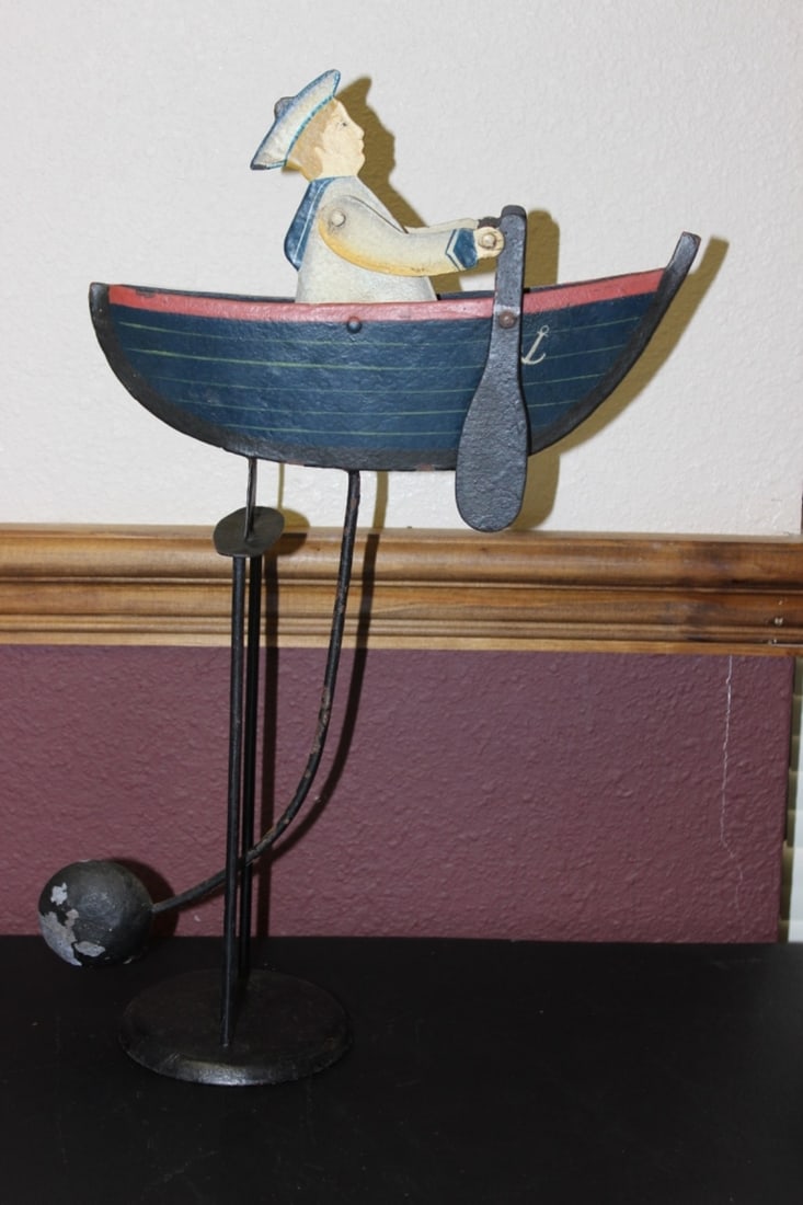 An Articulated Metal Balance: 16 inches long