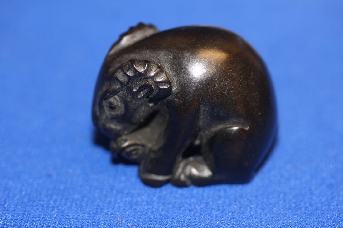 A Japanese Wooden netsuke: unsigned - 1 5/8" across