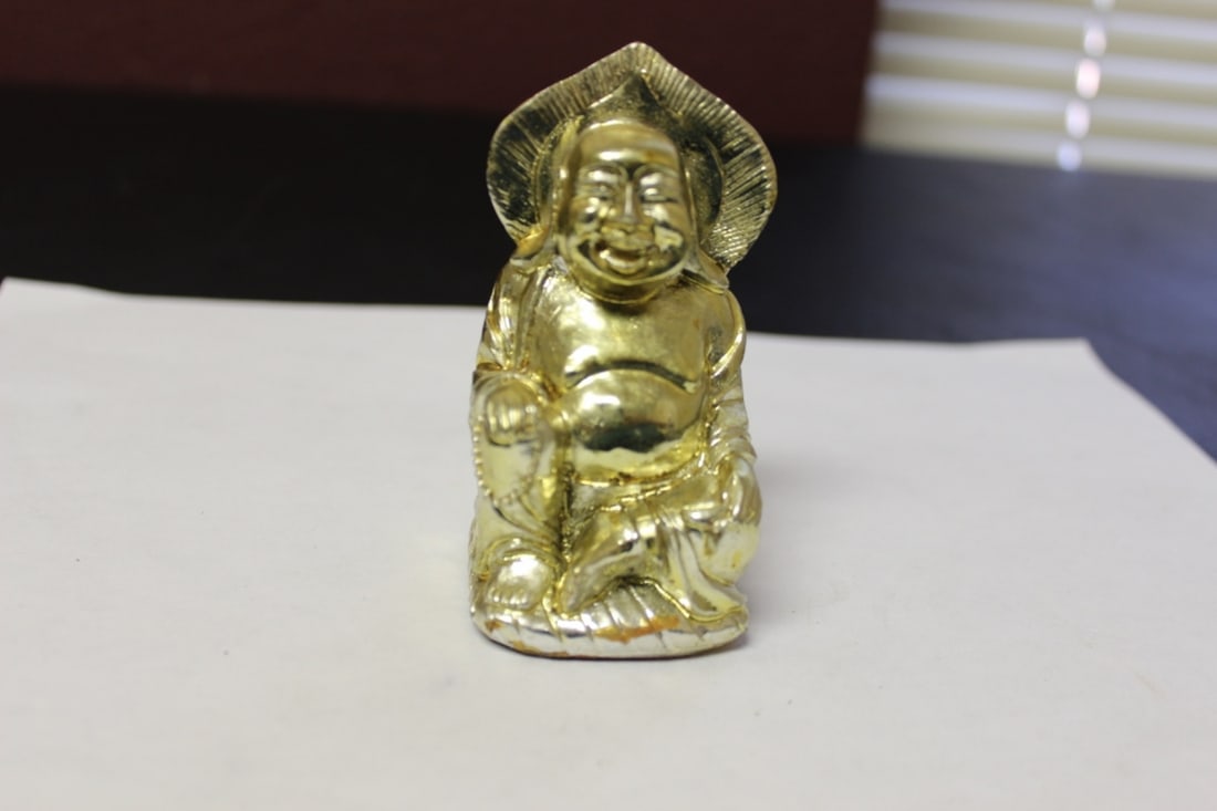 A Gold Buddha - Resin: 3 1/2 inches tall