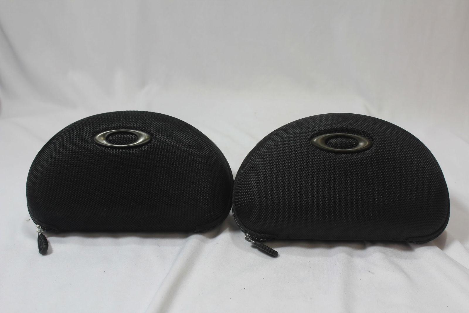 Set of Two Holders: Possibly for eyeglasses or sun glasses