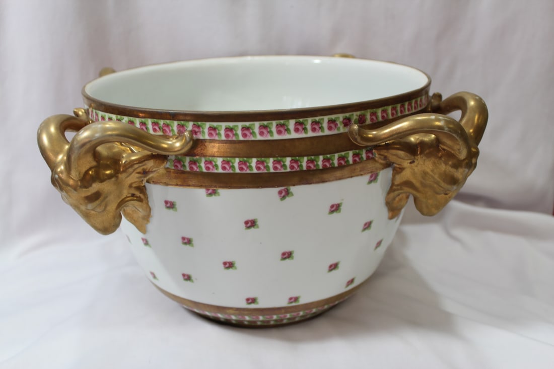 A Large Center Bowl with Ram Head Handles: 7 3/8" tall and 10 5/8" wide - marked